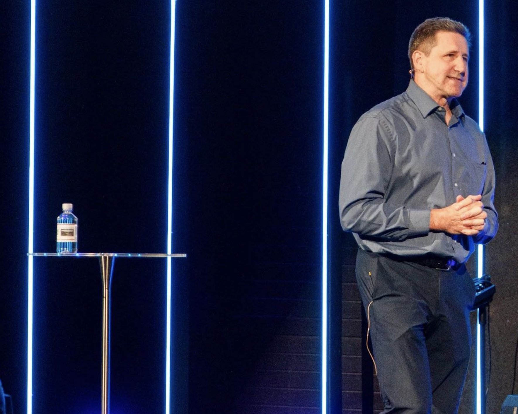 Michael Wozniak speaking on stage